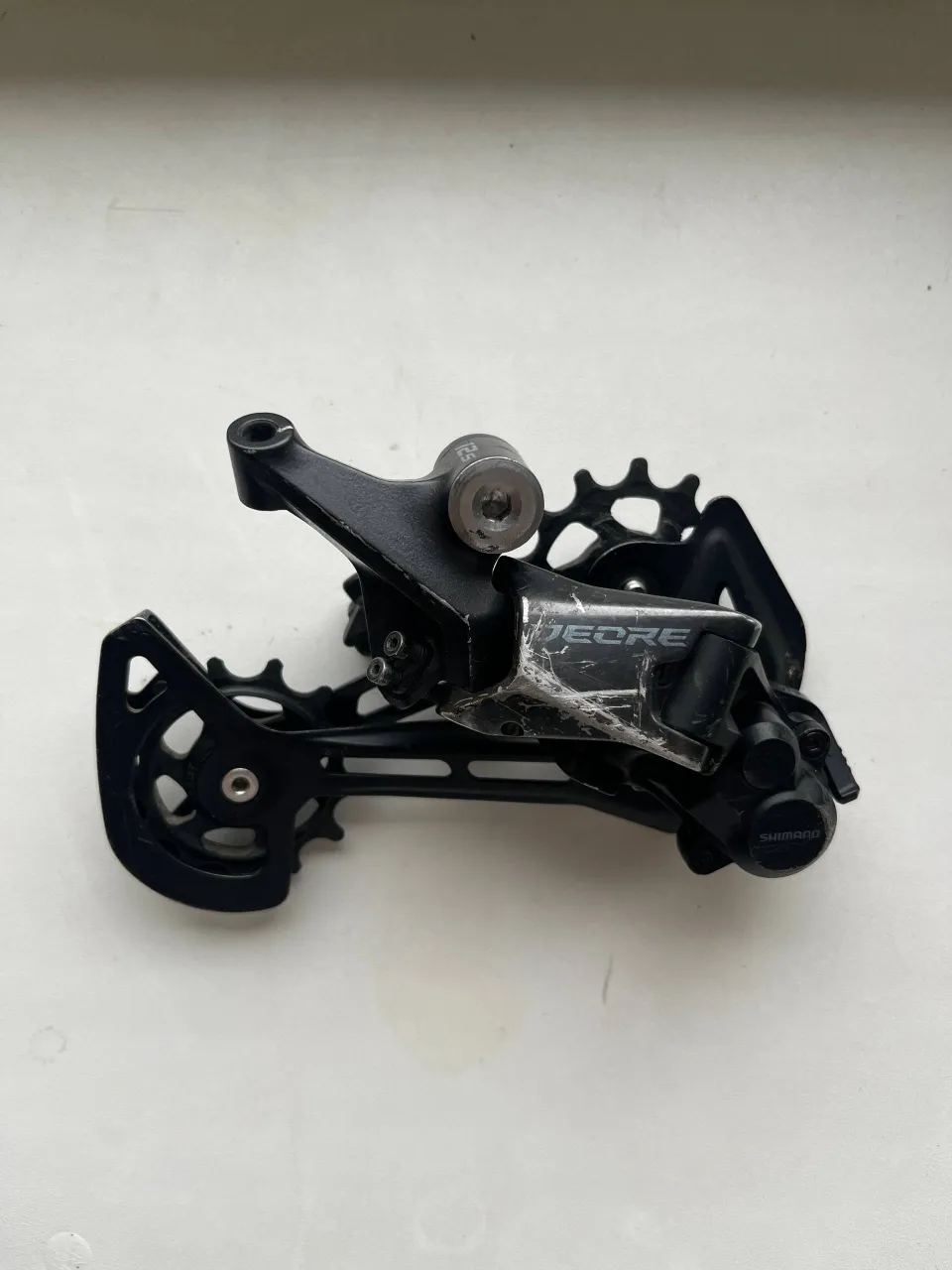 Задній перемикач Shimano Deore M6100 12 швидкостей фото 1