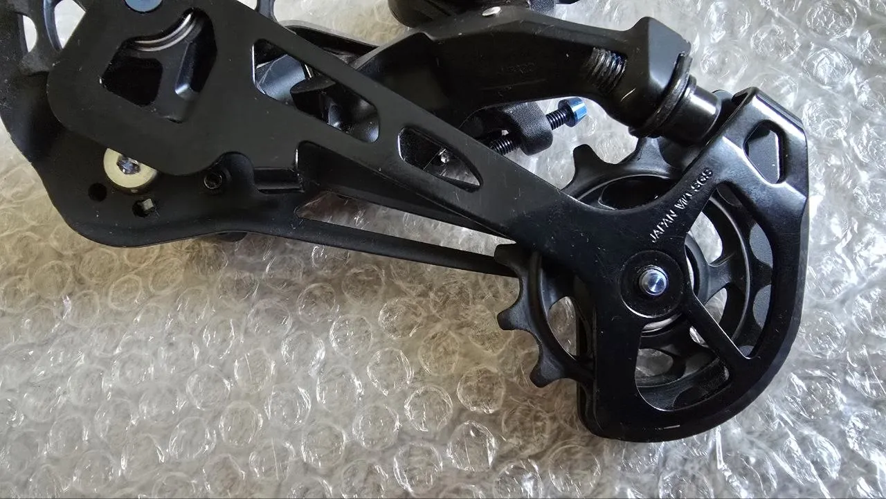 Перемикач та манетка Shimano Deore XT 12-speed фото 6