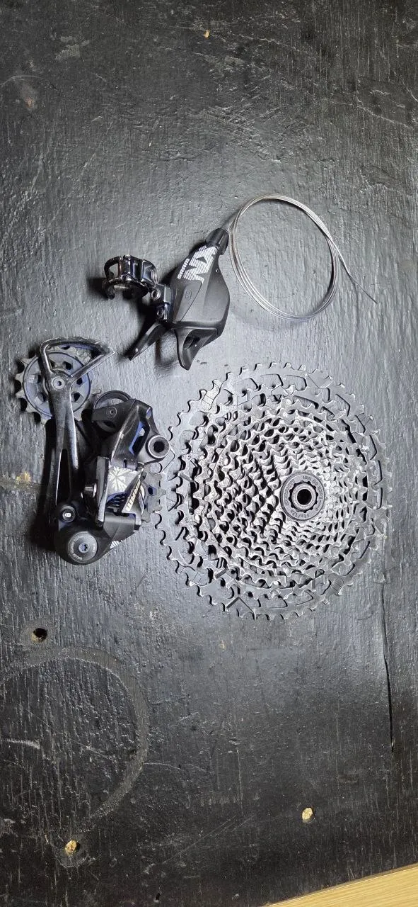 Задній перемикач SRAM NX Eagle + касета SRAM + ланцюга фото 1