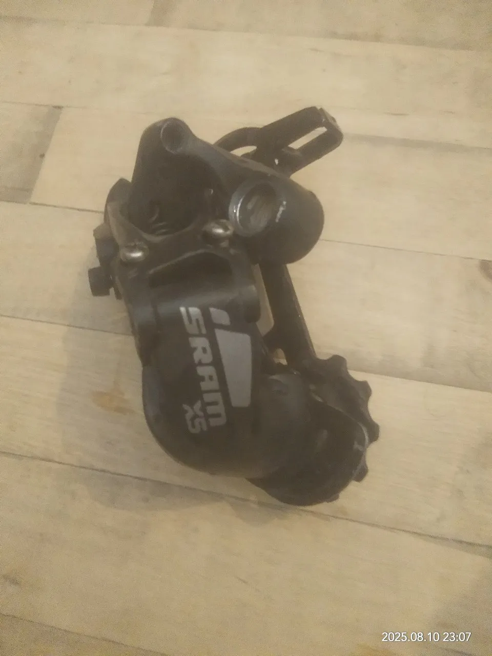 Перемикач задній SRAM X5 9 швидкостей фото 2