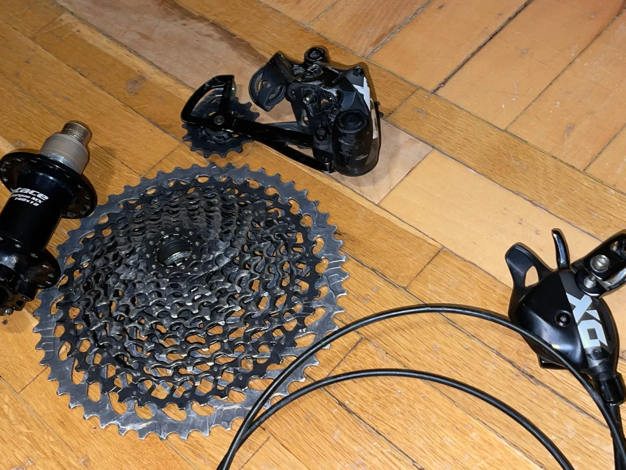 Руль Truvativ Descendant + Касета SRAM + Перемикач SRAM XO1 + Монетка SRAM + Втулка Syncros 148x12 XD фото 4