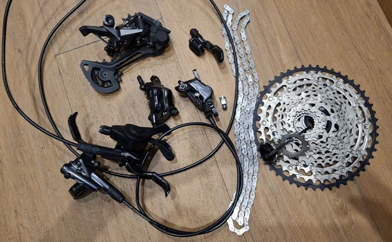 Shimano SLX касета + Deore XT перемикач + гальма + диски фото 1