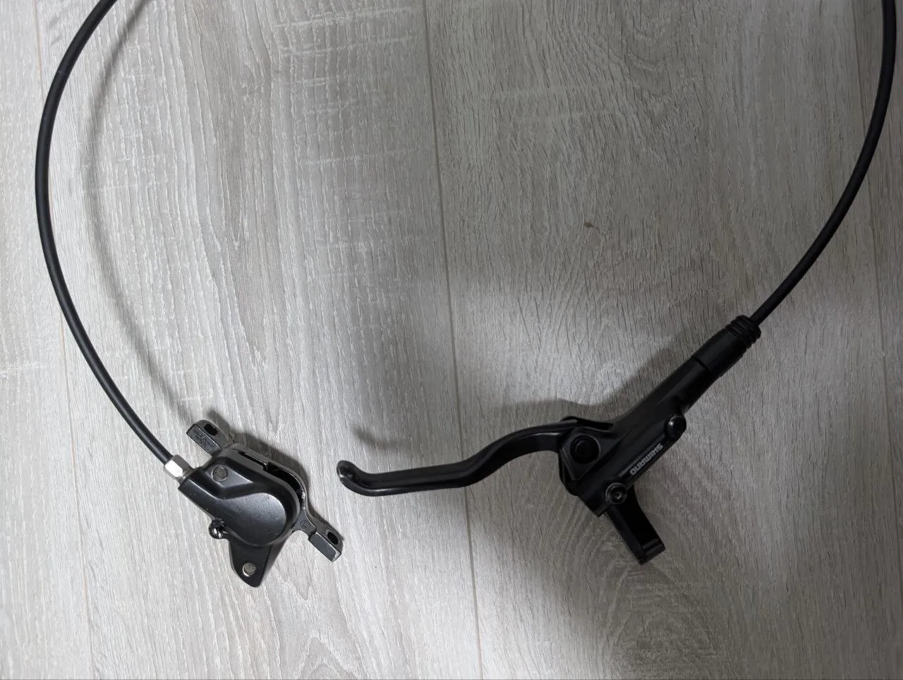 Передній гальмо Shimano MT200 фото 1