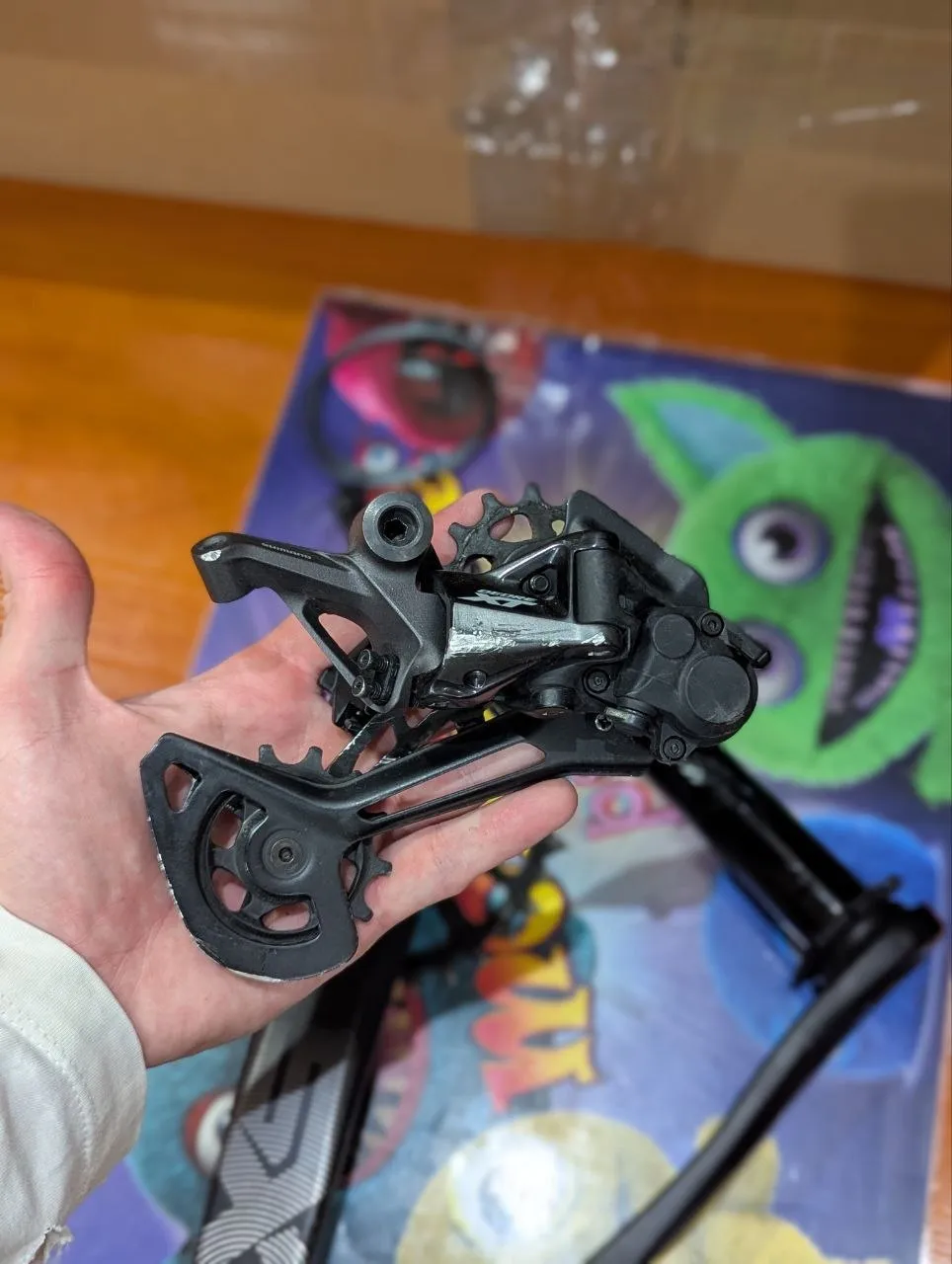 Перемикач Shimano Deore XT RD-M8100 + налокітники TLD Rogue Elbow + грипси Nukeproof фото 1