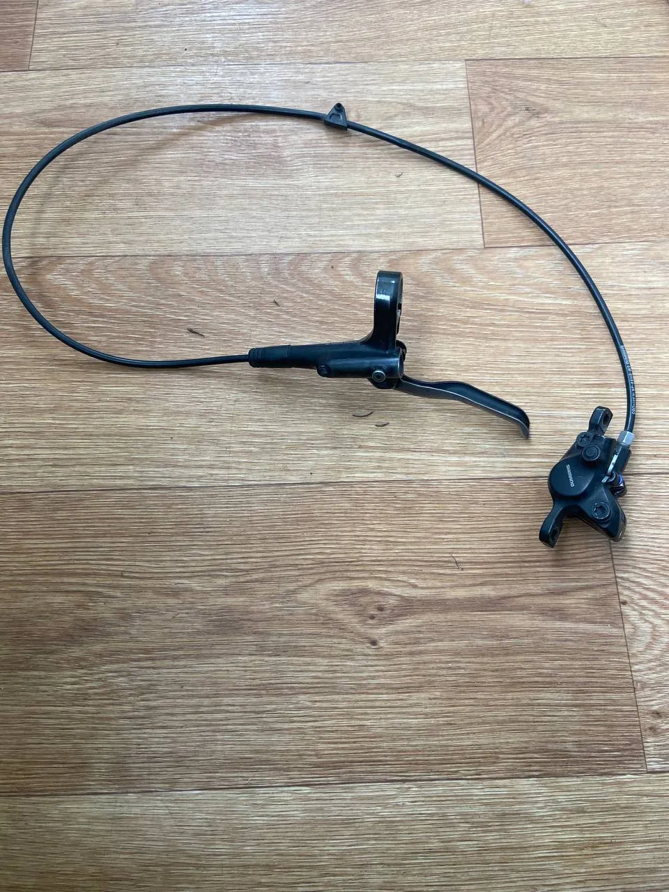 Shimano MT200 гідравлічна гальма передня фото 1