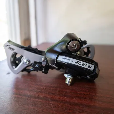 Задній перемикач Shimano Acera RD-M360
