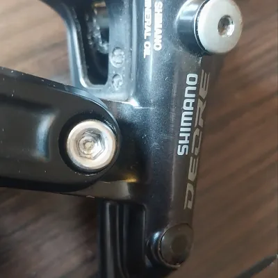Задній гальмо Shimano Deore