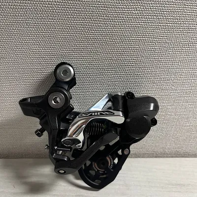 Задній перемикач Shimano Saint