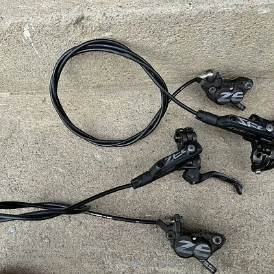 Гальма Shimano Zee 4-поршня