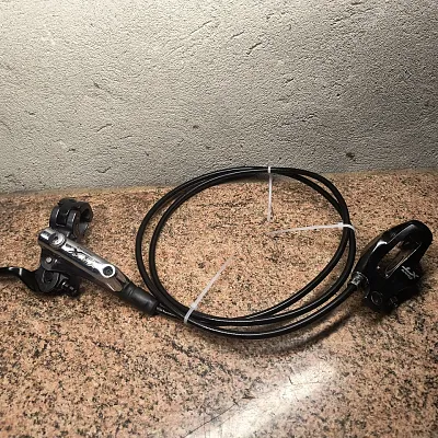 Задній гальмо Shimano XT