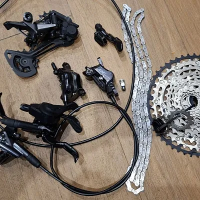 Shimano SLX касета + Deore XT перемикач + гальма + диски