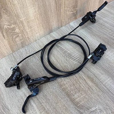 Гальма Shimano Zee гідравлічні 4-поршневі