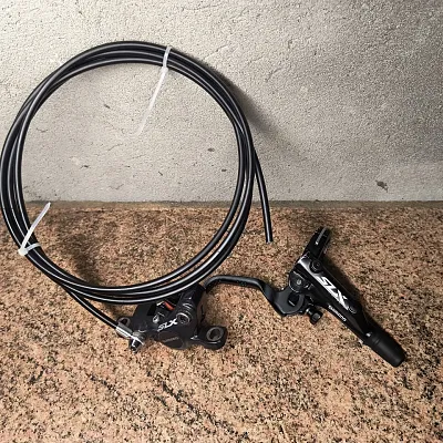 Задній гальмо Shimano Deore SLX