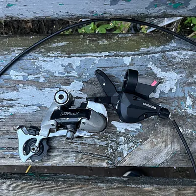 Манетка Shimano M310 + Перемикач Shimano Deore LX