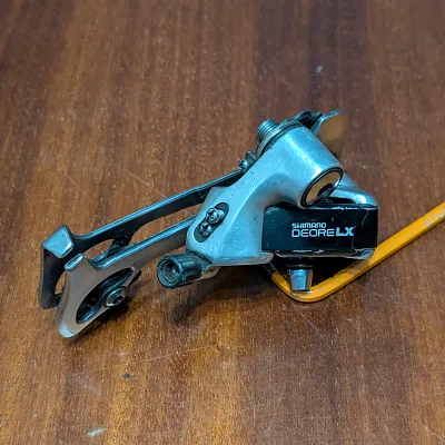 Задній перемикач Shimano Deore LX з роликами Tacx