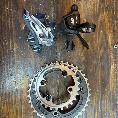 Передній перемикач Shimano Deore XT 2x + зірки